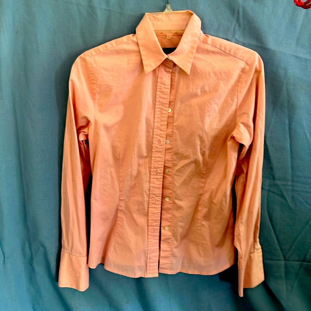 Light pink long sleeve women’s button up shirt